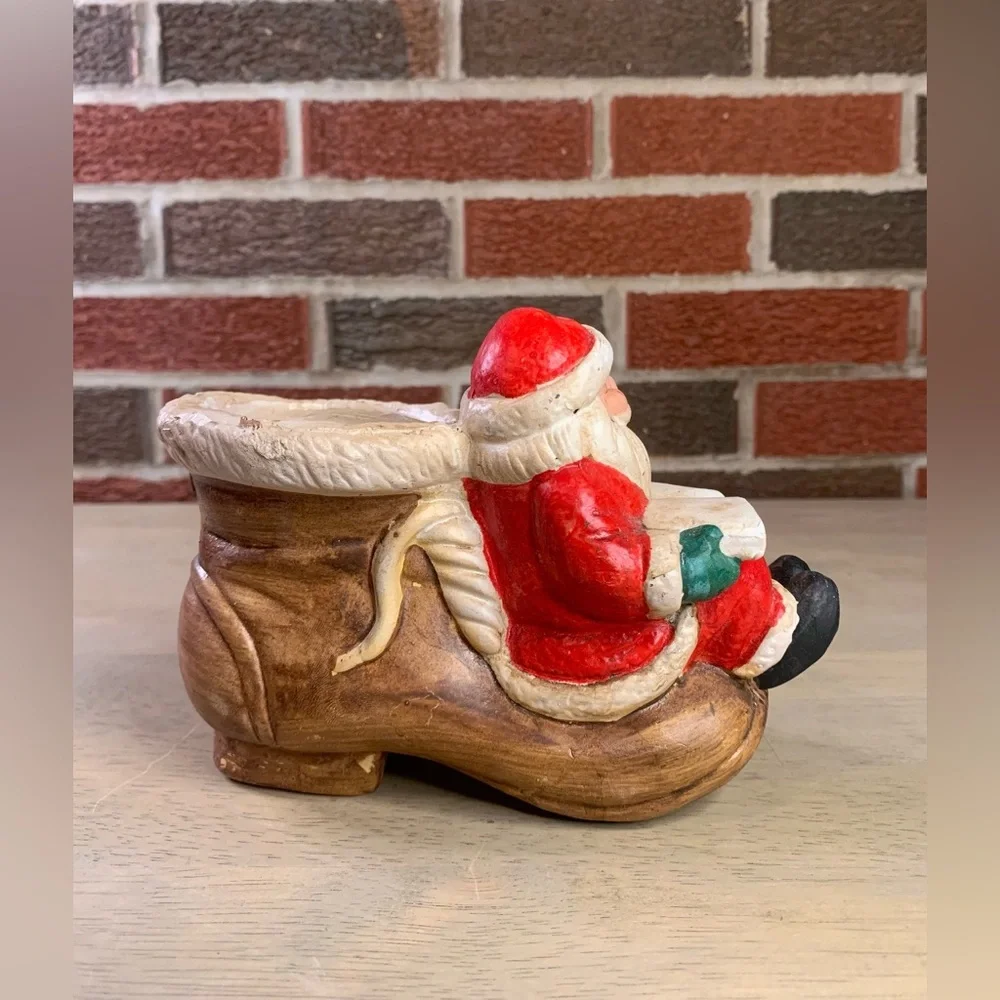 Vintage‎ Artmark’s Christmas Santa w/Book Sitting on Ceramic Boot Shoe Planter